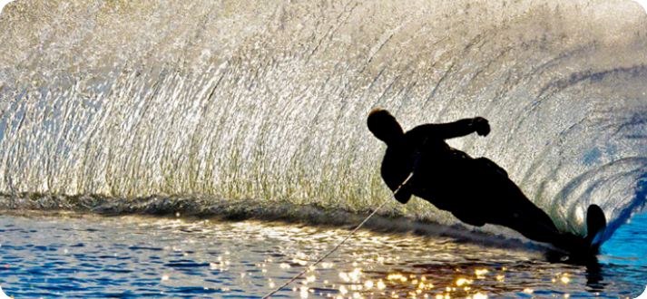 A person is water skiing in the lake.